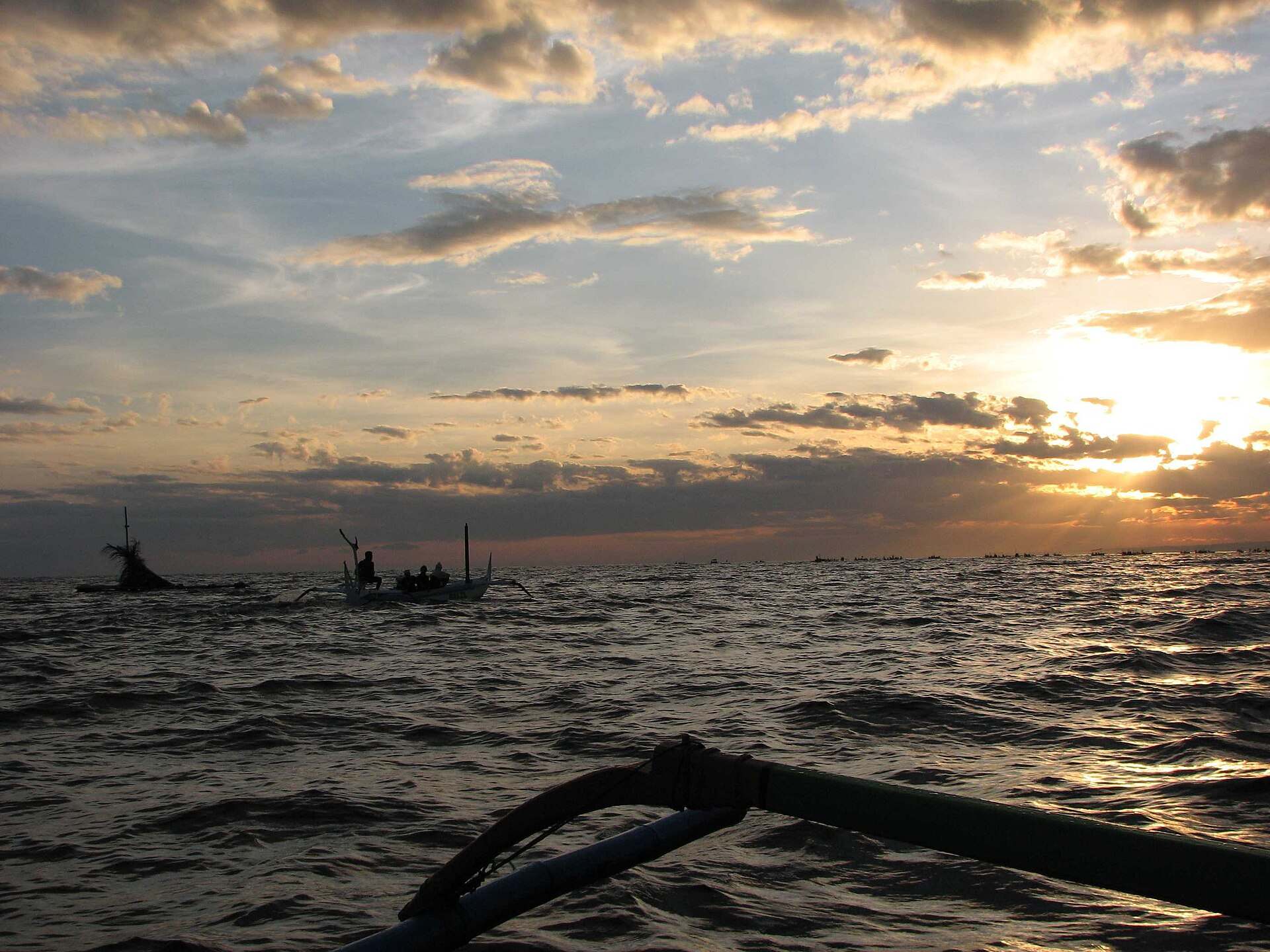 Sunrise over the sea seen from a jukung on a Lovina dolphin trip